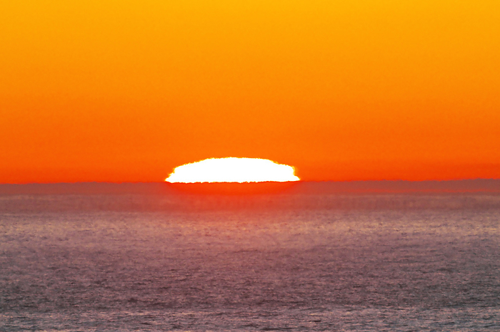 Sunrise and mirage  horizon  in the Pacific Ocean, Hokkaido, Japan  2 C