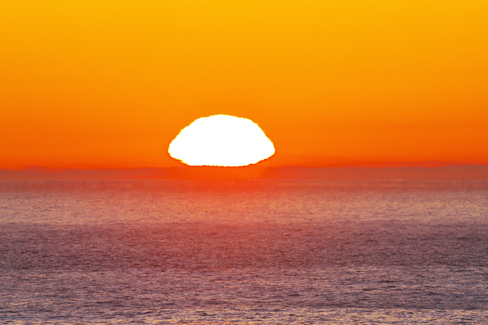 Sunrise and mirage  horizon  in the Pacific Ocean, Hokkaido, Japan  2 C