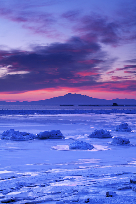 Morning drift ice and Shari dake in the Sea of Okhotsk, Hokkaido Near Futatsuiwa