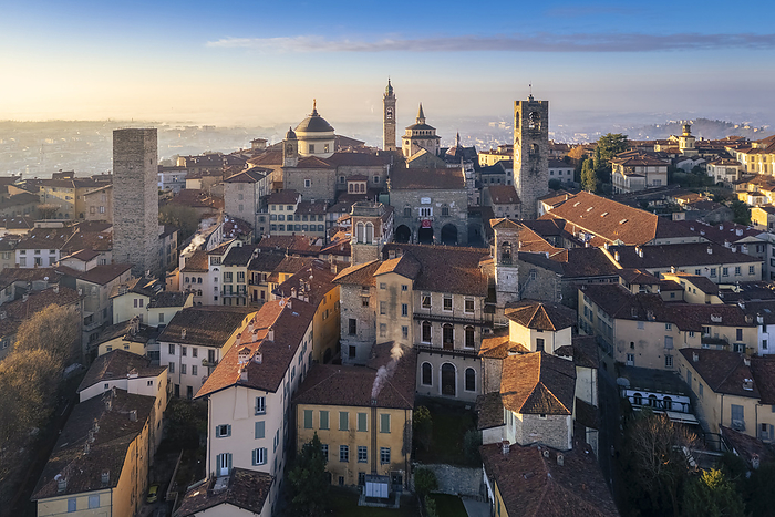 Lombardy, Italy View of the rooftops, churches and towers of the Upper Town  Citt  Alta  of Bergamo city at sunrise. Bergamo, Lombardy, Italy.