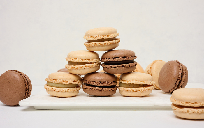 Chocolate macarons on a white background, dessert Chocolate macarons on a white background, dessert