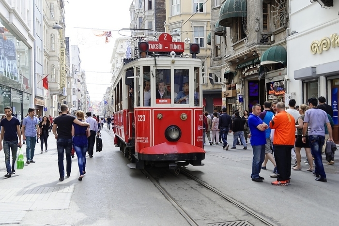 Istanbul, Turkey Historic tram Nostaljik Tramvay travelling through Istiklal Caddesi shopping street, Beyo lu, Istanbul, European part, Istanbul province, Turkey, Asia