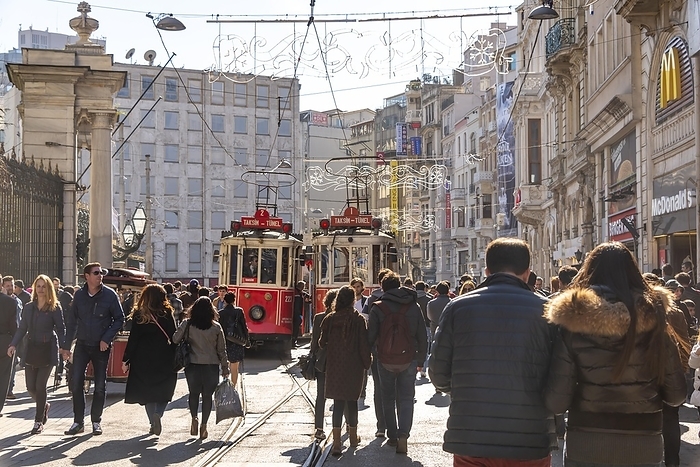 Istanbul, Turkey Historic trams between crowds,  stiklal Caddesi, Independence Street, Istanbul, Turkey, Asia
