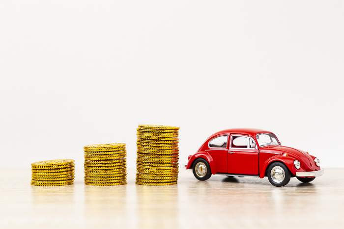 Toy cars and toy gold coins