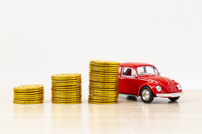 Toy cars and toy gold coins
