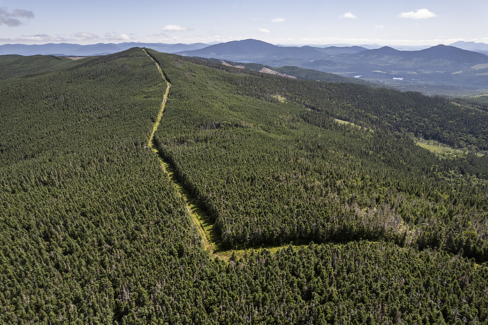 Canada U.S. border nternational border follows forest ridgeline between USA and Canada Woburn, Qu bec, Canada