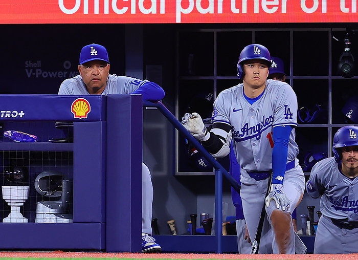 2024 MLB  Blue Jays Dodgers Otani waits to bat alongside Roberts  left  during the game  photo by Takahiro Mitsuyama .