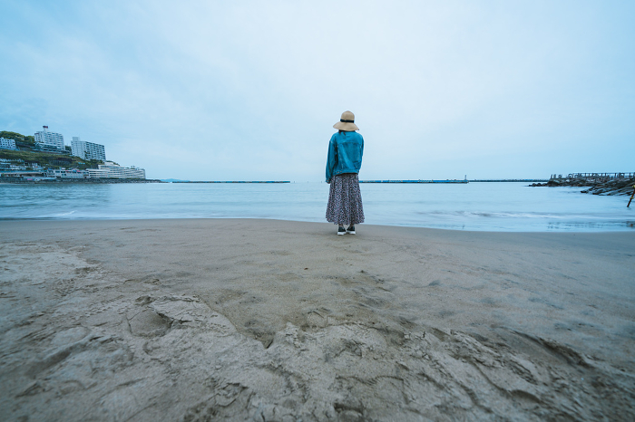 Woman enjoying the sea in Atami