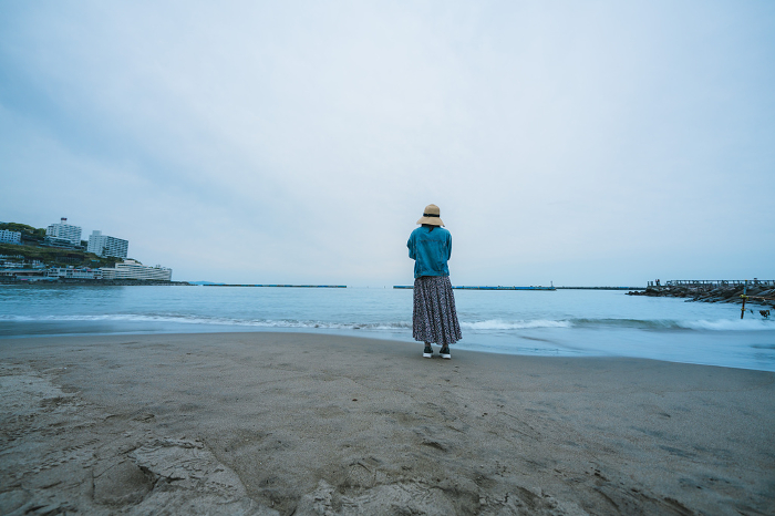 Woman enjoying the sea in Atami