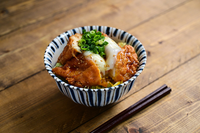 bowl of rice topped with fried tofu