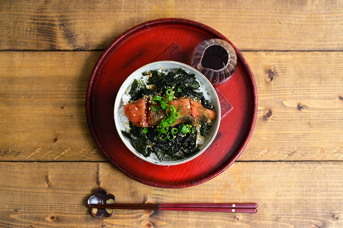 bowl of rice topped with cod roe marinated in kombu