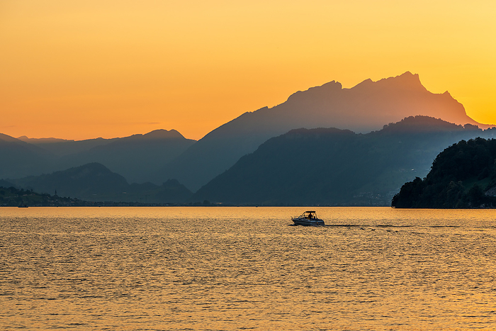 Sunset at Lake Lucerne in Switzerland. Sunset at Lake Lucerne in Switzerland., by Zoonar Bernhard Klar