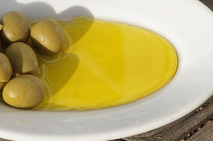 Olea europaea, Olivenoel, olive oil Olea europaea, Olivenoel, olive oil, by Zoonar Peter Himmelh