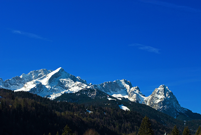 Mountain panorama of the snow covered Wetterstein mountains in spring Mountain panorama of the snow covered Wetterstein mountains in spring, by Zoonar Andreas Malli