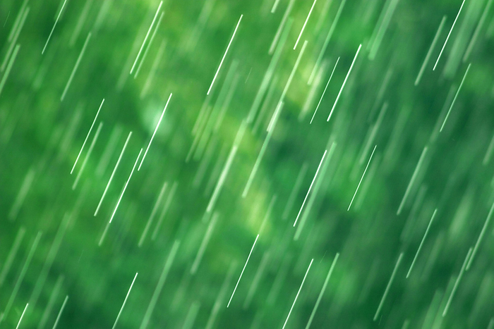 many bright raindrops of a rain shower against green background, motion blur many bright raindrops of a rain shower against green background, motion blur, by Zoonar Dirk v. Malli