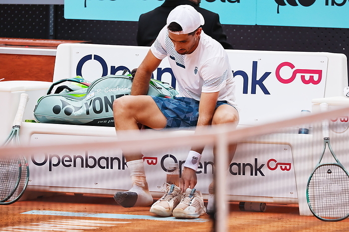 2024 Madrid Open Men s 3rd Round Pedro Cachin  ARG , APRIL 29, 2024   Tennis : Pedro Cachin replaces shoes that were damaged during singles round of 32 match against Rafael Nadal on the ATP tour Masters 1000  Mutua Madrid Open tennis tournament  at the Caja Magica in Madrid, Spain.  Photo by Mutsu Kawamori AFLO 