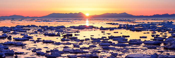 Sunrise and drift ice in the Shiretoko mountain range Hokkaido
