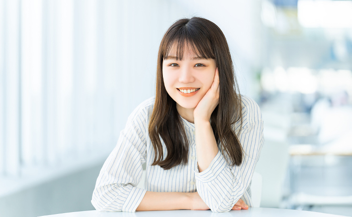 Smiling Japanese businesswoman with cheekbones (Female / People)