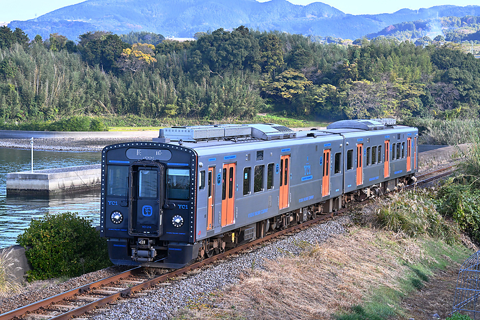Series YC1 diesel train running along the seaside on the Omura Line, Nagasaki Taken at Senben Station   Matsubara Station