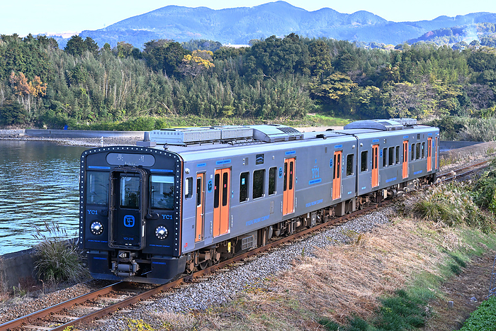 Series YC1 diesel train running along the seaside on the Omura Line, Nagasaki Taken at Senben Station   Matsubara Station