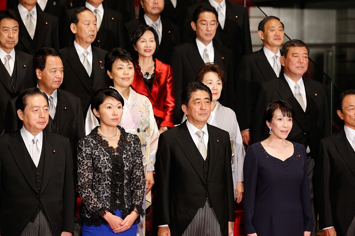 The Second Abe Cabinet Set to Set Sail First cabinet meeting is over, and the  daisies  are photographed. September 3, 3014, Tokyo, Japan   Japan s Prime Minister Shinzo Abe, center, is flanked by two newly appointed female members of his Cabinet as they pose for photographers on the steps of the prime minister s office in Tokyo following an attestation ceremony at the Imperial Palace They are, front row from left: Akihiro Ota, minister of Land, Infrastructure, Transport and Tourism  Yuko Obuchi, minister of Economy, Trade and Industry  Abe  Sanae Takaichi, minister of Internal Affairs and Communications  and Finance Minister Taro Aso. Second row, from left: Akira Amari, minister of Economic Revitalization  Haruko Arimura, minister of Promoting Women  Eriko Yamatan, minister of the Abduction Issues  and Shigeru Ishiba, minister of Revitalizing Regional Cconomies and Communities.