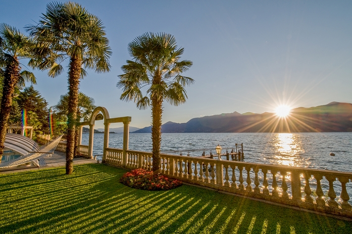 Lake Maggiore, Italy Sunset Chill out in hammock with beautiful view at Lake Maggiore during a romantic summer sunset