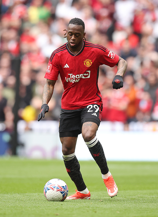 Coventry City v Manchester United   Emirates FA Cup Semi Final Aaron Wan Bissaka of Manchester United on the ball during the Emirates FA Cup Semi Final match between Coventry City and Manchester United at Wembley Stadium on April 21, 2024 in London.   WARNING  This Photograph May Only Be Used For Newspaper And Or Magazine Editorial Purposes. May Not Be Used For Publications Involving 1 player, 1 Club Or 1 Competition Without Written Authorisation From Football DataCo Ltd. For Any Queries, Please Contact Football DataCo Ltd on  44  0  207 864 9121