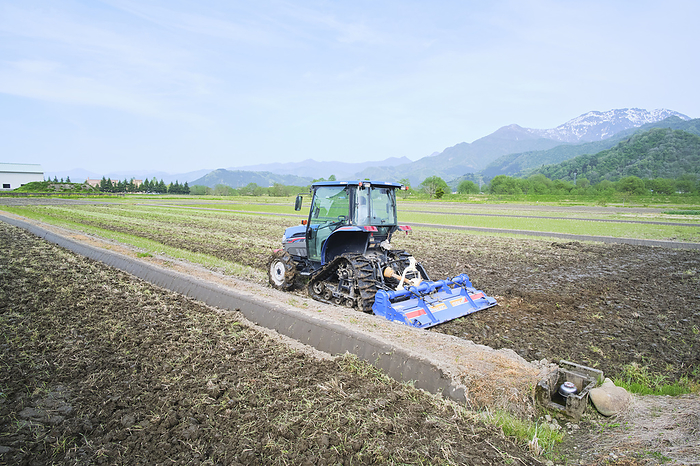 Photographed in 2024 Rice cultivation in Minamiuonuma   rice field preparation April 2024 Minamiuonuma City, Niigata Prefecture