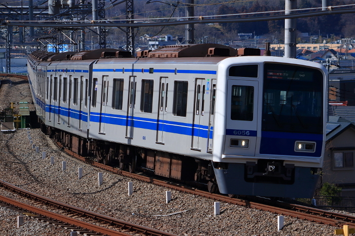 A 6000 series commuter train on the Seibu Ikebukuro Line curves