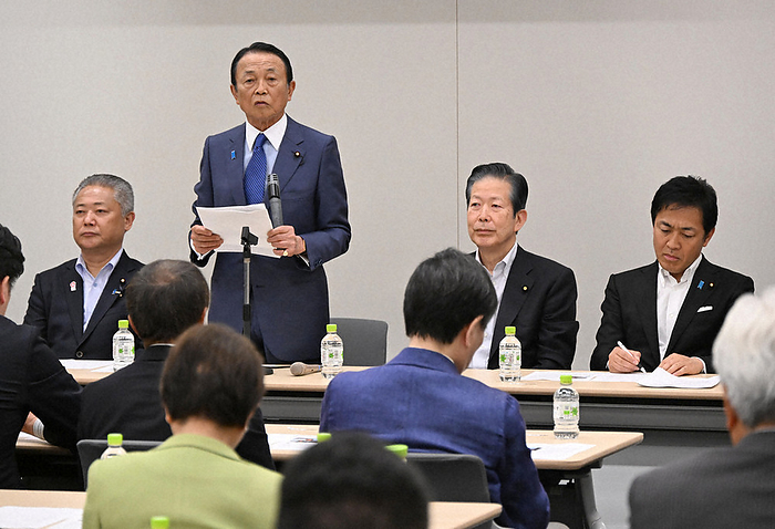 Establishment meeting of the Diet Members Caucus for the realization of the 100th anniversary of the Showa era by the national government LDP Vice President Taro Aso  second from left  addresses the inaugural meeting of the Diet Members Caucus, which aims to realize a national commemoration of the centennial of the Showa era. On the left is Nobuyuki Baba, representative of the Japan Restoration Association  third from left is Natsuo Yamaguchi, representative of the New Komeito Party  and on the right is Yuichiro Tamaki, representative of the Democratic Party of Japan  at the House of Councilors, May 7, 2024, 5:05 p.m.  photo by Akihiro Hirata