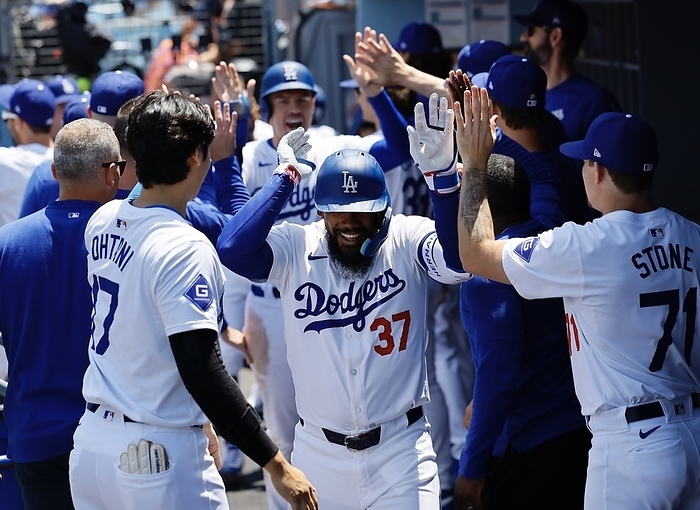 2024 MLB Dodgers Shohei Ohtani  left  greets Teoscar Hernandez, who hit a two run homer in the bottom of the sixth inning with two outs for the Dodgers against the Marlins, May 8, 2024, at Dodger Stadium date 20240509 place Los Angeles Dodger Stadium