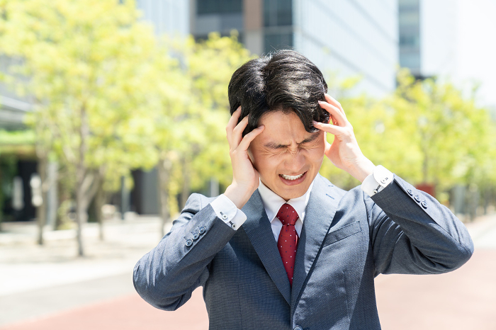 Japanese businessman in distress.