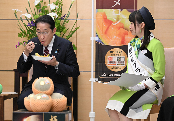 Prime Minister Fumio Kishida tasting a melon presented by the delegation from Hokota City Prime Minister Fumio Kishida  left  tasting a melon presented by the delegation from Hokota, Japan, at the Prime Minister s Office, May 8, 2024, 2:10 p.m.  photo by Akihiro Hirata