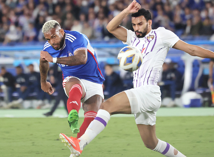 Japan s Yokohama F. Marinos defeated UAE s Al Ain FC at the first leg match of the ACL final May 11, 2024, Yokohama, Japan   Japan s Yokohama F. Marinos forward Anderson Lopes  L  shoots the ball while UAE s Al Ain FC defender Khalid Eisa  R  attempts to block it during the AFC Champions League  ACL  final first leg match in Yokohama, suburban Tokyo on Saturday, May 11, 2024. Yokohama F. Marinos defeated Al Ain FC at the first match of the ACL final 2 1.       photo by Yoshio Tsunoda AFLO 