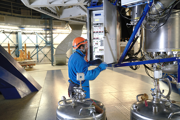 Astronomer adjusting machinery at Paranal Observatory in Chile