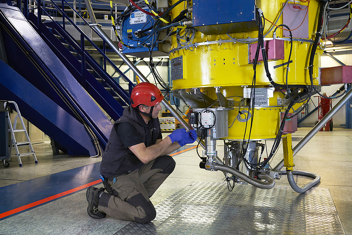 Astronomer adjusting machinery at Paranal Observatory in Chile