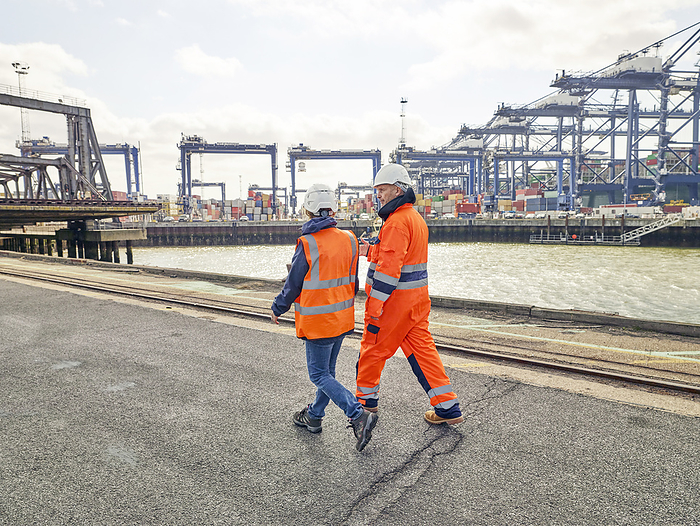 Dock workers walking at Port of Felixstowe, England
