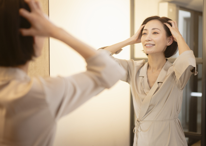 Japanese woman giving night care (People)