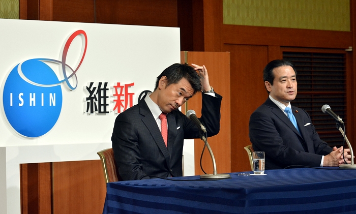 The  Restoration Party  Formed Aiming at Political Realignment and Rallying the Forces September 21, 2014, Tokyo, Japan   Co leaders Toru Hashimoto, left, and Kenji Eda meet the media in a news confernce folliwng an inaugural meeting of a new political party in Tokyo on Sunday, September 21, 2014. Two small political groups led by Hashimoto and Eda merged to form Japan Innovation Party, the second largest opposition group in the Diet.  Photo by Natsuki Sakai AFLO  AYF  mis 