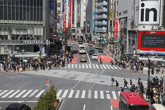 Shibuya Scramble Crossing April 12, 2014, Tokyo, Japan   Shibuya, one of Tokyo s bustling shopping and entertainment districts, is known for its pedestrian crossing system, Shibuya Scramble that stops all vehicular traffic and allows pedestrians to cross in every direction, including diagonally, at the same time. Five streets meet in front of Shibuya railroad station, forming the Barnes Dance, where at the gurn of traffic lights, pedestrians inundate the intersection from all directions.  Photo by Haruyoshi Yamaguchi AFLO  VTY  mis  