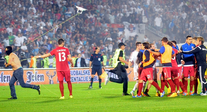 Euro 2016 Qualifiers. Match stopped due to a brawl at the end of the first half A pitch invader, OCTOBER 14, 2014   Football   Soccer : A Serbian fan tries to escape with drone carrying provocative flag of Great Albania during the UEFA EURO 2016 Qualifying Group I match between Serbia and Albania at Stadion FK Partizan in Belgrade, Serbia. The match was suspended after a brawl at 41 minutes.  Photo by AFLO 