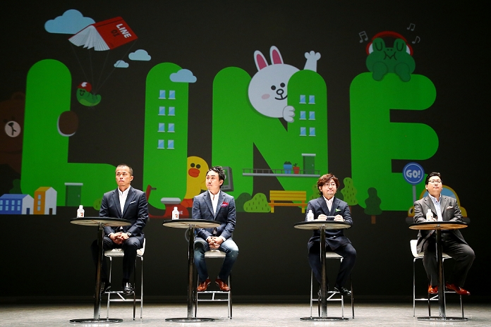 LINE Announces New Service Providing Payment Functions, etc. LINE, which develops free communication applications for smartphones, held the  LINE CONFERENCE TOKYO 2014,  a business strategy presentation event, on September 9. In addition to the payment service  LINE Pay  and the cab dispatch service  LINE TAXI,  LINE aims to become a comprehensive platform used in daily life by developing a wide range of services, such as  LINE Manga  in collaboration with Kodansha and Shogakukan, and the announcement of joint venture companies with Avex and Sony Music. LINE s  from left  Senior Executive Officer Shintaro Tabata, COO Tsuyoshi Dezawa, President Ryo Morikawa, and Senior Executive Officer Jun Masuda attend the event on the afternoon of October 9, 2014, in Urayasu City, Chiba Prefecture.