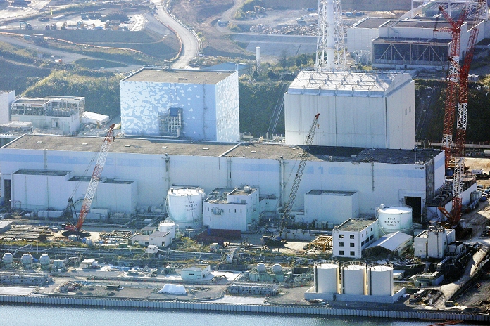 TEPCO Fukushima Daiichi Nuclear Power Plant  October 19, 2014  TEPCO s Fukushima Daiichi Nuclear Power Station, Units 1, 2, and 3  from right to left, from the head office plane on October 19 