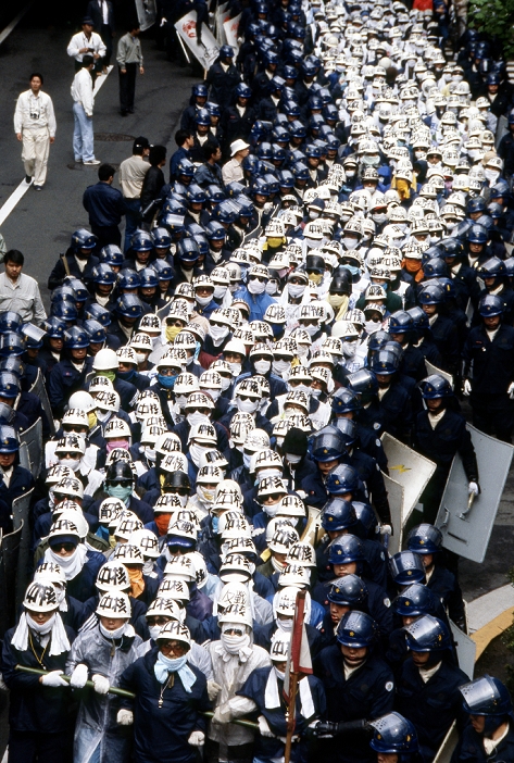 Militant Demonstration  June 1986  June, 1986, Tokyo, Japan   Wearing helmets and towels to protect themselves from riot police tear gas, radical left wing protesters take to the streets of Tokyo in an anti government demonstration.  Photo by Haruyoshi Yamaguchi AFLO  VTY  mis  