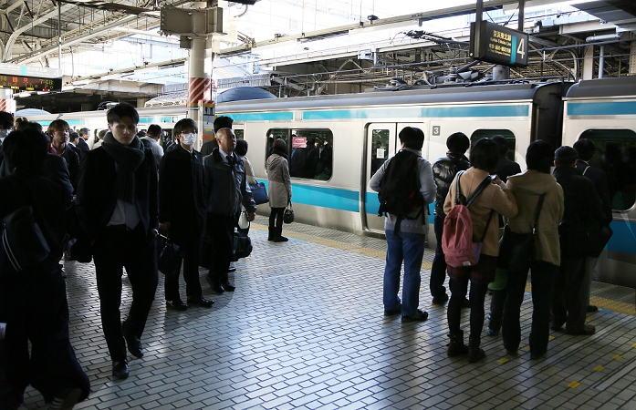 JR East Ueno Station  November 14, 2014, Tokyo, Japan   Commuters line up in a good manner to get onboard a crowded train at Tokyo s Ueno railroad station during the morning peak rush hours on Friday, November 14, 2014. The Keihin Tohoku Line s congestion rate of the 600 meter stretch between Ueno and the next stop at Okachimachi is astonishing 200 percent, the worst crowded line in the metropolis, according to a 2013 survey.  Photo by Haruyoshi Yamaguchi AFLO  VTY  mis 