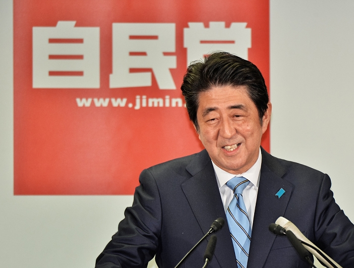 Prime Minister Abe Holds Press Conference Following the overwhelming victory in the general election Shinzo Abe, December 15, 2014, Tokyo, Japan : Japan s Prime Minister and President of the ruling Liberal Democratic Party  LDP , Shinzo Abe attends the press conference at the party s headquarter in Tokyo, Japan, December 15, 2014.  Photo by AFLO 
