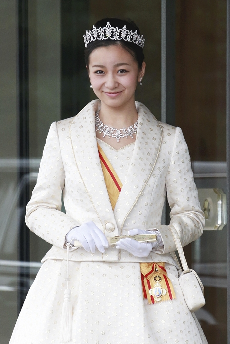 Princess Kako turns 20 Greeting Their Majesties in formal attire Kako, the second daughter of Prince and Princess Akishino, celebrated her 20th birthday on the 29th, and attended her coming of age ceremony at the Imperial Palace. She is the second of the four grandchildren of Their Majesties the Emperor and Empress to reach the age of majority, following Kako s older sister, Mako  23 . On the morning of the same day, after visiting the Three Imperial Palaces, where the ancestors of the Imperial Family and others are enshrined, Kako received the Grand Cordon of the Order of the Precious Crown from His Majesty the Emperor at the palace. In the afternoon, after greeting Their Majesties the Emperor and Empress, he went to the entrance of the palace. Dressed in formal attire, wearing a white robe with a gold thread floral pattern on the robe d collet , a tiara, and the decoration, Princess Kako smiled and responded to the congratulations from the press. At the West Carriageway of the Palace, Imperial Palace  photo taken December 29, 2014.