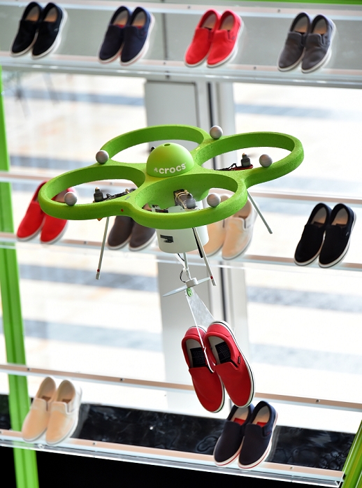 Flying Shoe Store Opens Drones Deliver Goods March 7, 2015, Tokyo, Japan   A drone flies to the shelves and fetches a pair of tennis shoes to an awaiting customer at the  flying shoe shop  in Tokyo on As a customer uses an iPad to place an order, the drone takes off and delivers the requested pair from as many as 80 shoes displayed on a special stand, about 5 meters high and 10 meters wide.  Photo by Natsuki Sakai AFLO  AYF  mis 