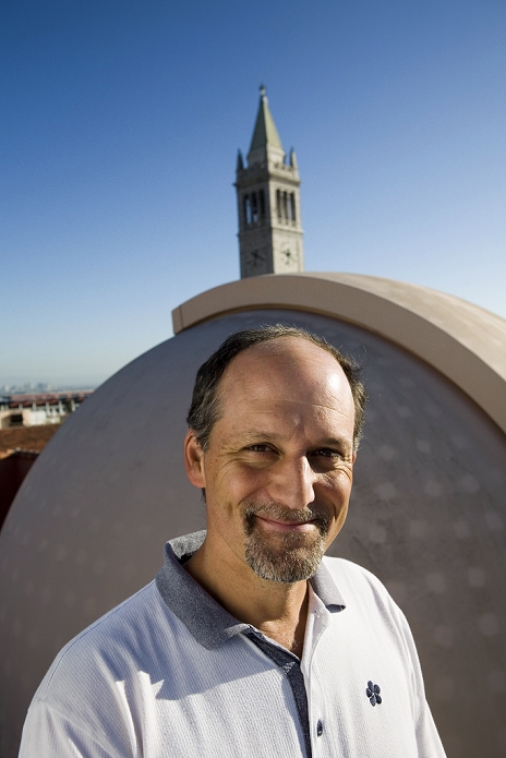 Jeffrey Marcy  2006, 5 years  Geoffrey Marcy  born 1954 , US astronomer, on the roof of Campbell Hall at the University of California, Berkeley, with the dome of a 14 inch telescope. Marcy is one of the world s leading researchers into planets around stars other than our Sun. Together with his team, using data from large telescopes at other sites, he discovered 70 of the first 100 exoplanets identified. Marcy has been Professor of Astronomy at UC Berkeley since 1999. The tower is Sather Tower  built 1914 . Photographed in May 2006.