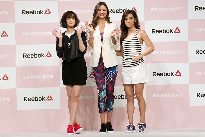 Tina Tamashiro, Miranda Kerr and Anne Nakamura, Apr 15, 2015 : (L to R) A guest model and Reebok classic ambassador Tina Tamashiro, the Australian model Miranda Kerr and the fashion model Anne Nakamura pose for the cameras during the Reebok Skyscape Fashion Show on April 15, 2015 in Tokyo, Japan. Miranda Kerr, who is very popular in Japan, is the Reebok global ambassador for the new footwear line 